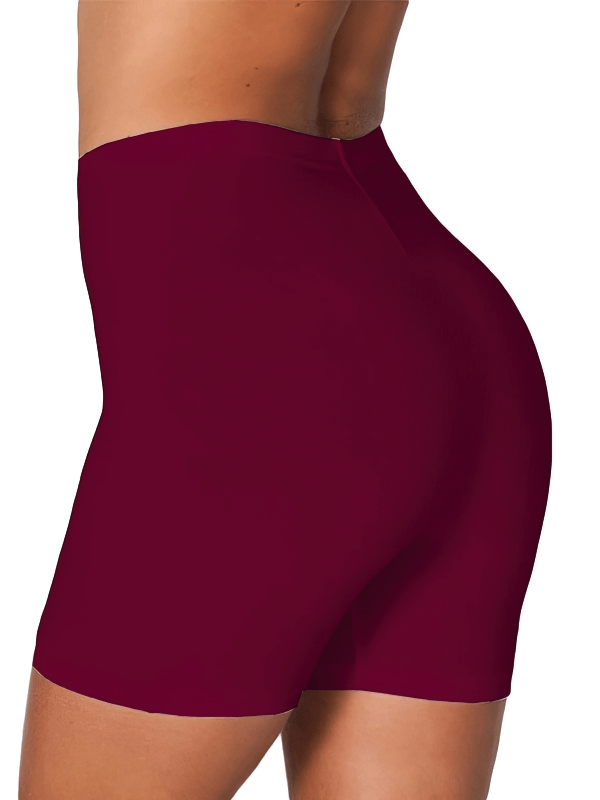 Side view of burgundy slim elastic women's high-waist fitness shorts, highlighting breathable, stretchy fit - SF0191